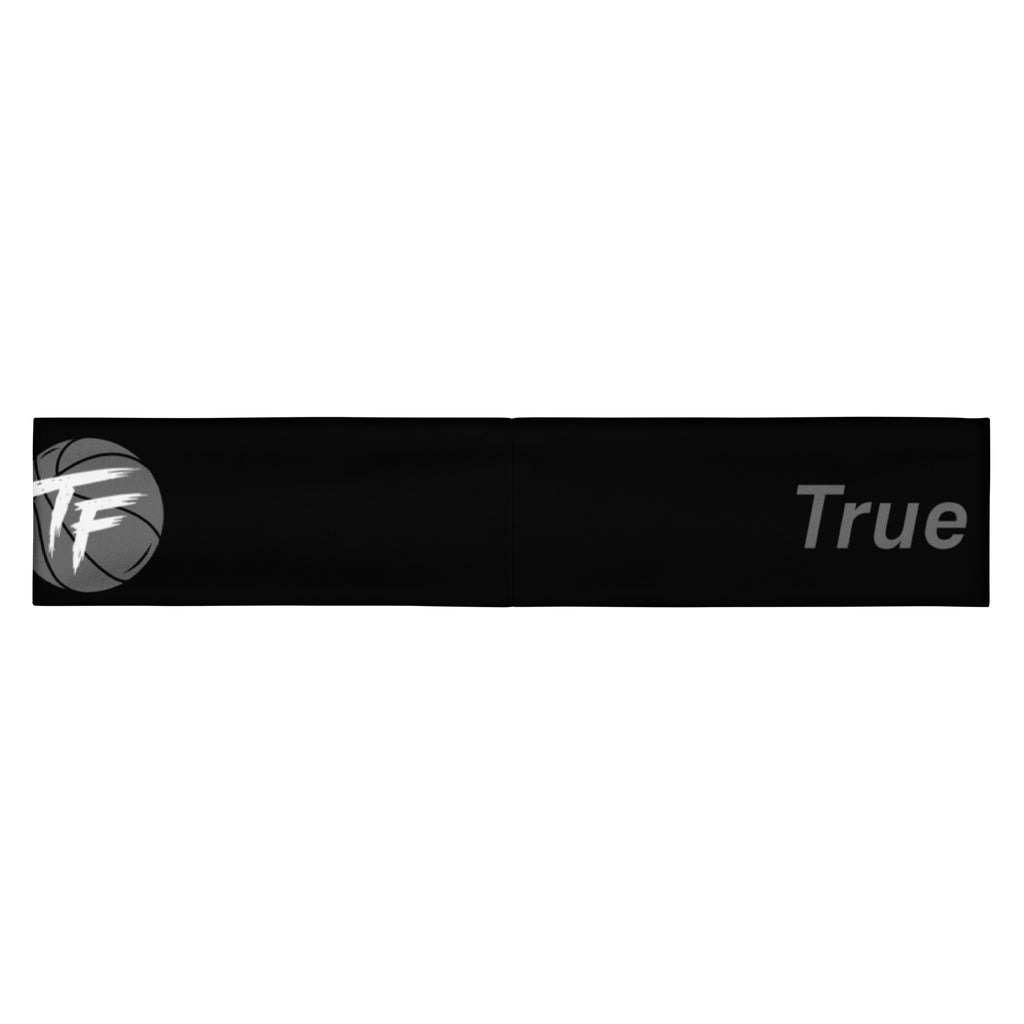 Back view of black True Form Athletic Headband with a circular TF basketball logo and True text.