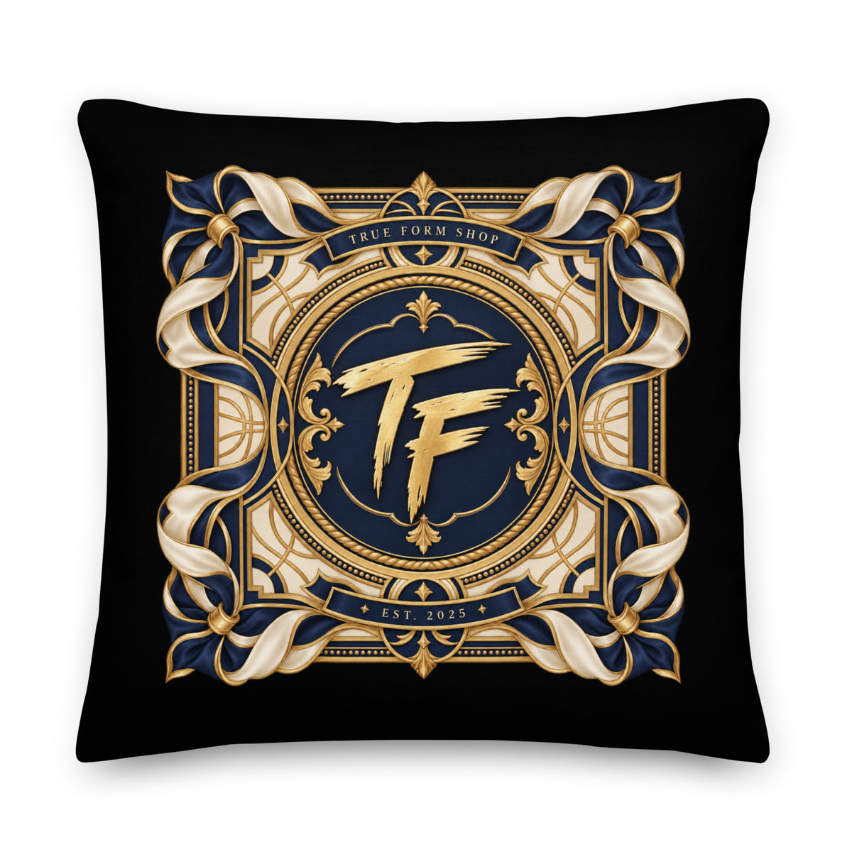Back view of black True Form premium lifestyle pillow with a gold and navy ornate TF emblem and True Form Shop lettering.