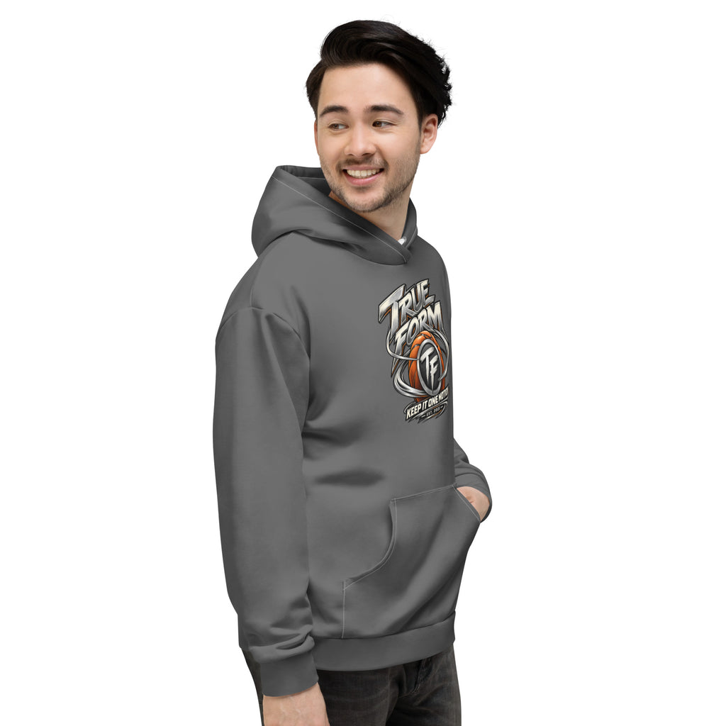 Model wearing the grey True Form premium relaxed fit motion performance hoodie with True Form basketball TF graphic and Keep it one motion lettering, shown from the right front.