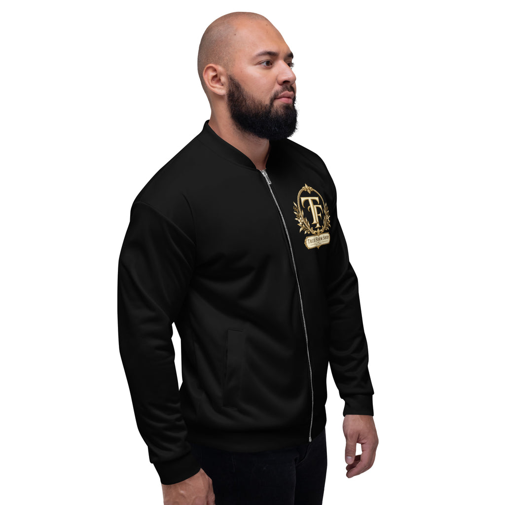 Black True Form Basketball Jacket Elite Performance Edition with a gold ornate True Form TF emblem and True Form Shop banner, shown worn from the front at an angle.