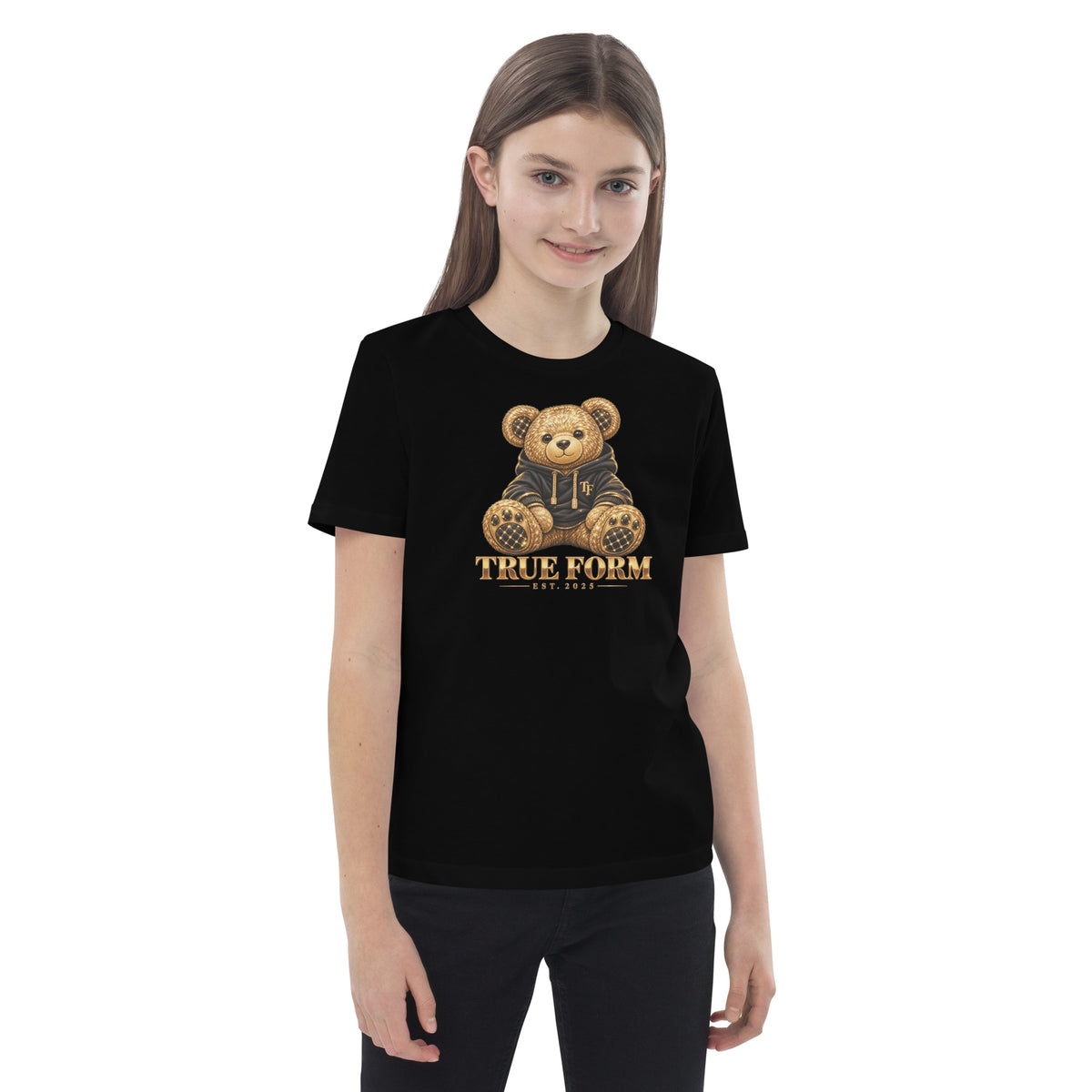 Black Motion Tee by True Form with a teddy bear graphic and True Form text, shown worn from the front.
