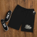 Black Men’s True Form Fleece Shorts with white True Form Athletic Goods text, shown flat lay.