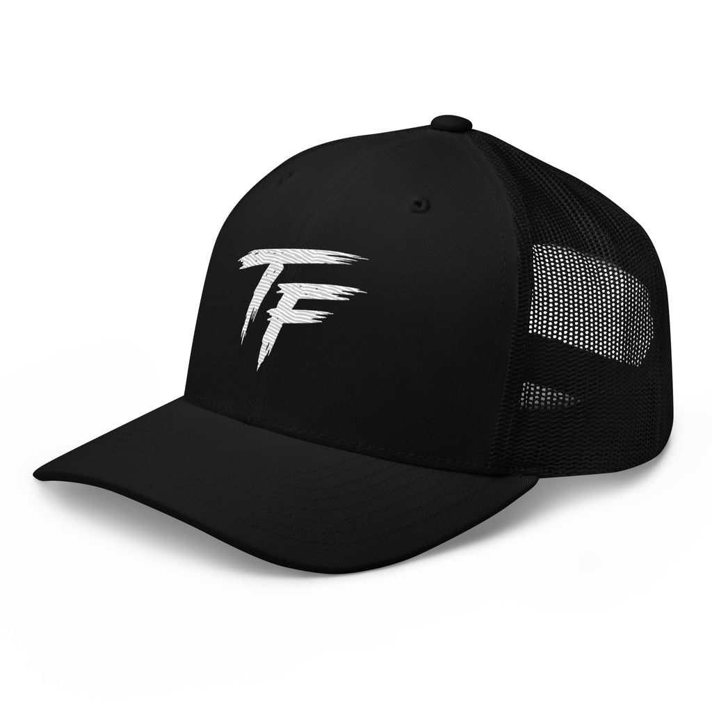 Black True Form classic six panel mesh back trucker cap with white TF logo, shown from the left front.