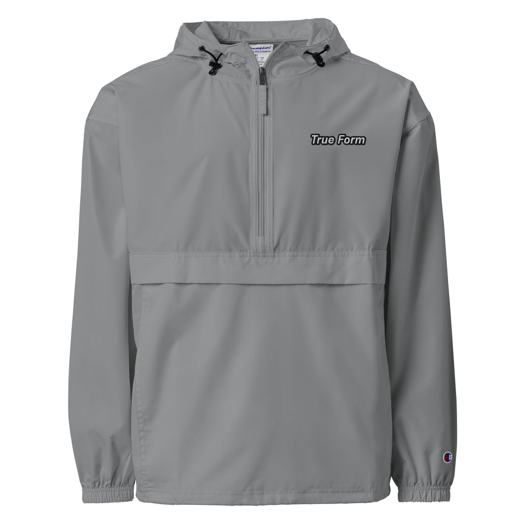 Graphite True Form embroidered Champion packable windbreaker jacket with True Form lettering on the chest.