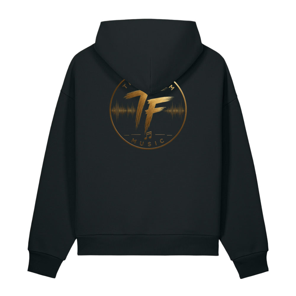 Back view of black True Form premium sculpted heavyweight fleece hoodie with gold TF Music emblem.