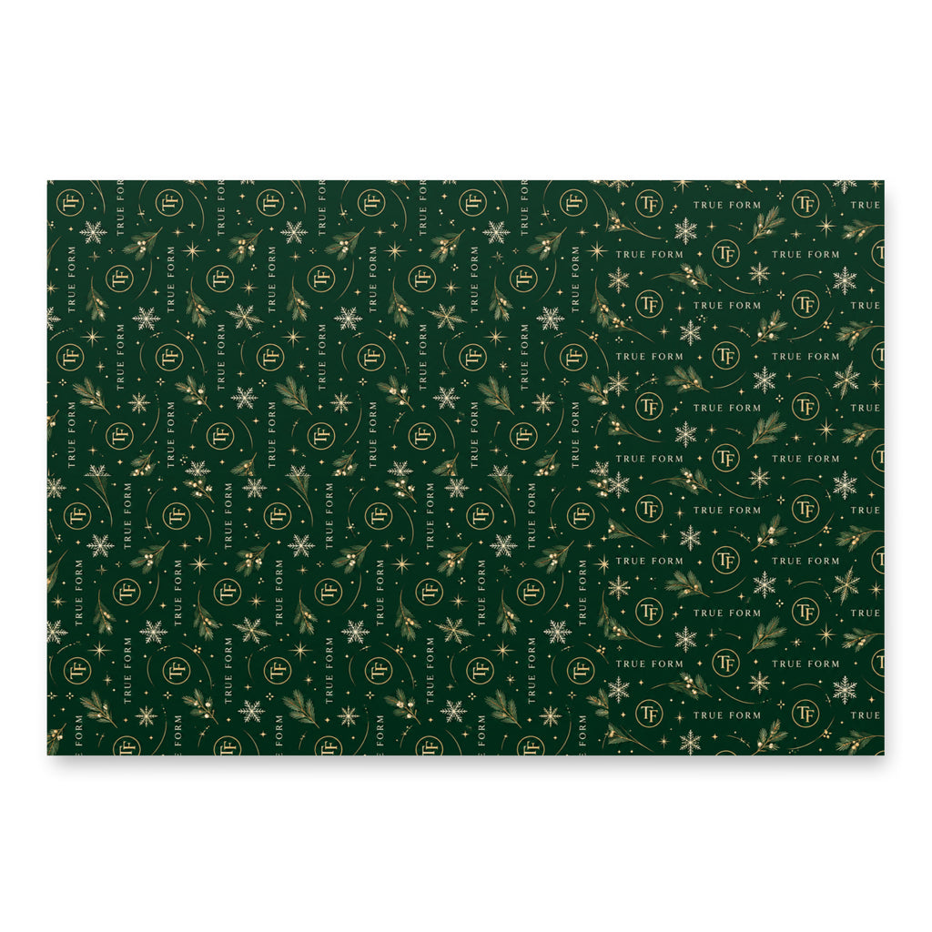 Deep green True Form premium holiday tree wrapping paper with a repeating TF logo, True Form lettering, and snowflake pattern.